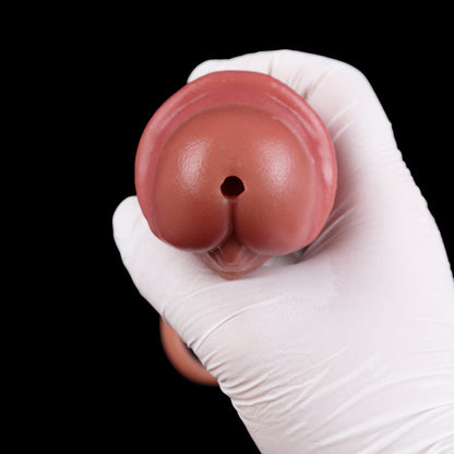 Realistischer Penis Sleeve in Hautbraun mit Venenstruktur, Hautfalten & Spritzsystem – Gummibirne & Spritze, Fixierband & Platin-Silikon